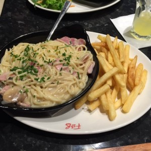 Spaghetti Carbonara, served with fries